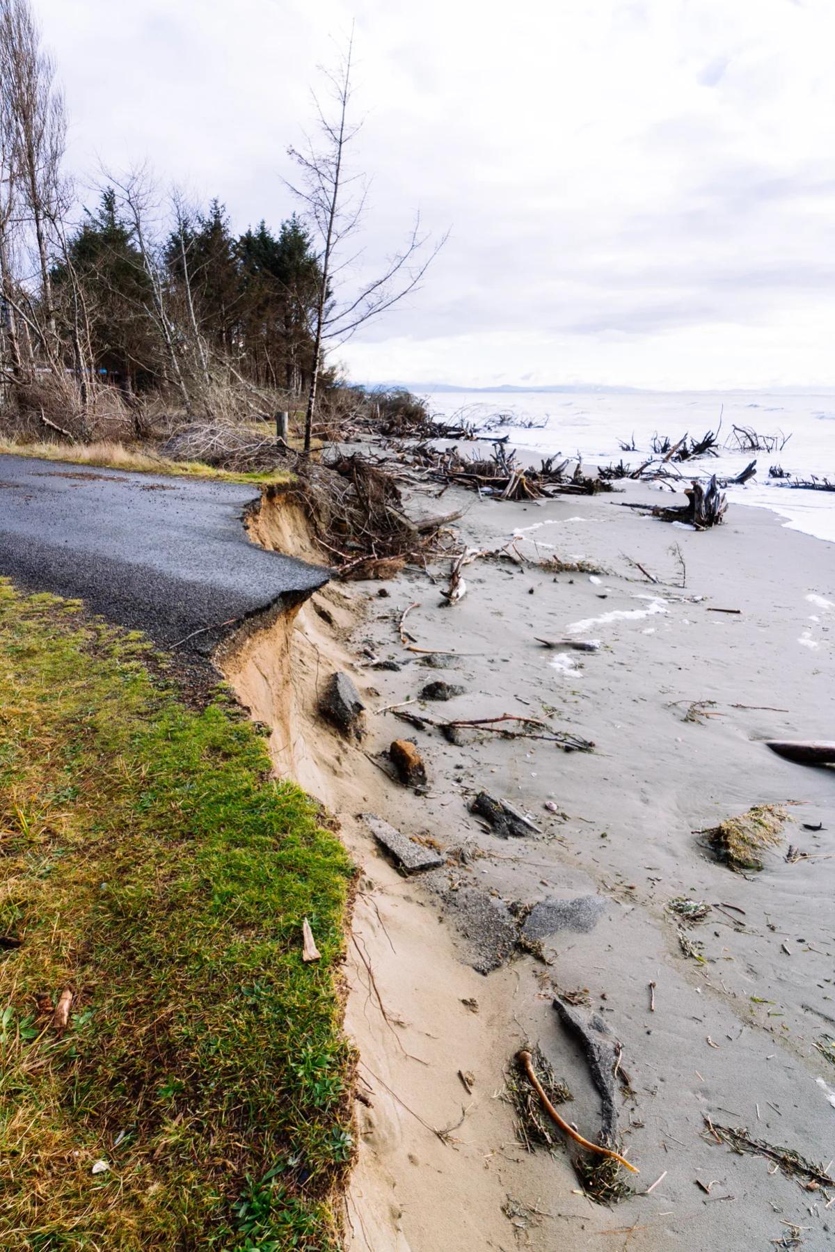 Roads end abruptly in what's left of the town of North Cove, WA as the ocean's erosion continues. Fragments of road at Washaway Beach serve as a reminder that there is an entire community underneath the sand.