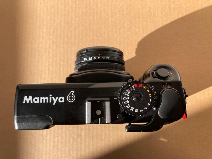 Mamiya 6 - stored position. If the lens is retracted, I know that the lens cap should also be on and I’m not ready to shoot.