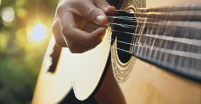 A close-up of a person's hands strumming an acoustic guitar, with sunlight filtering through a window and casting a warm glow on the guitar.