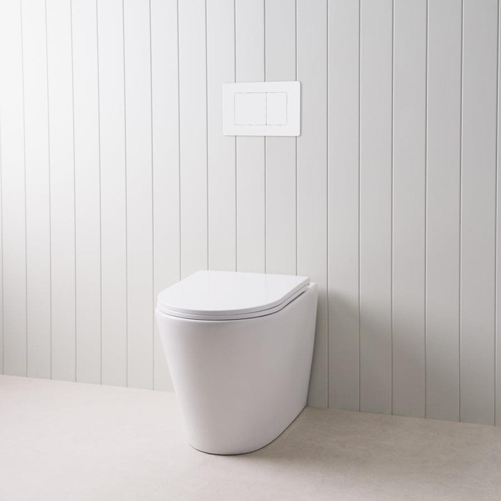 Angled In-Wall Toilet With Rectangle Matte White Buttons | Yabby