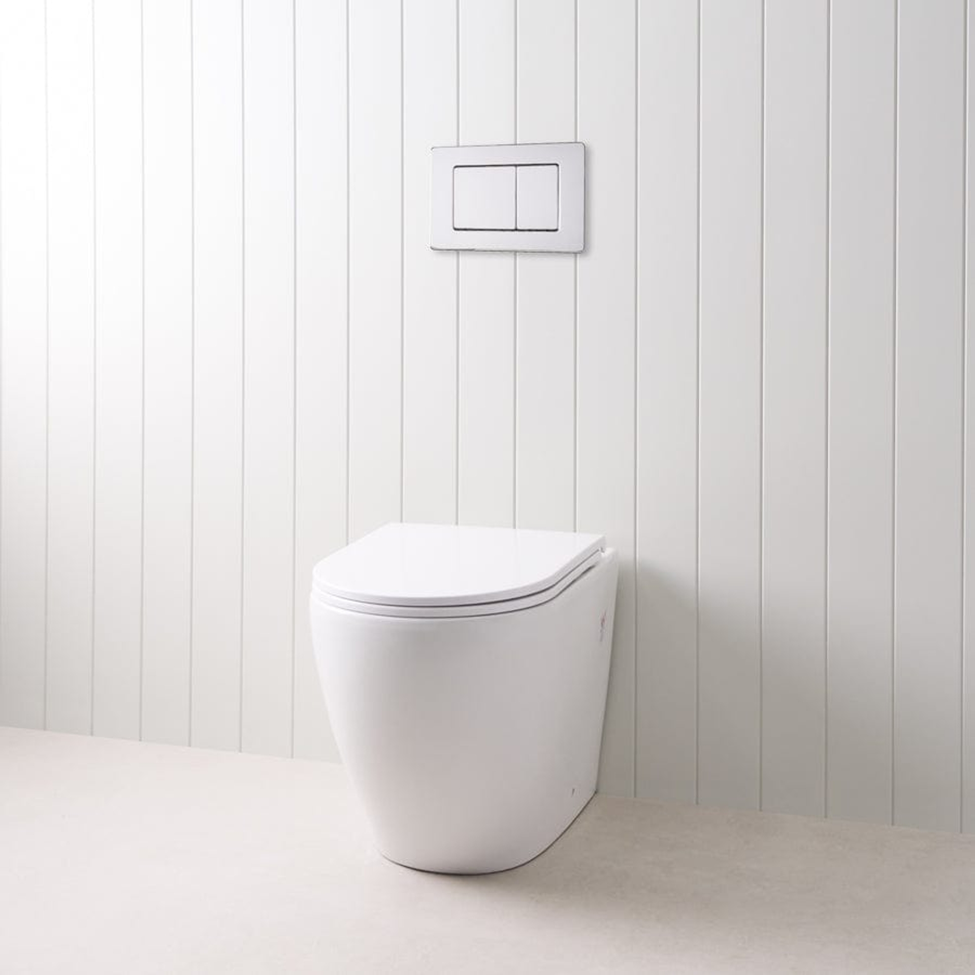 Curved In-Wall Toilet With Rectangle Chrome Buttons | TileCloud