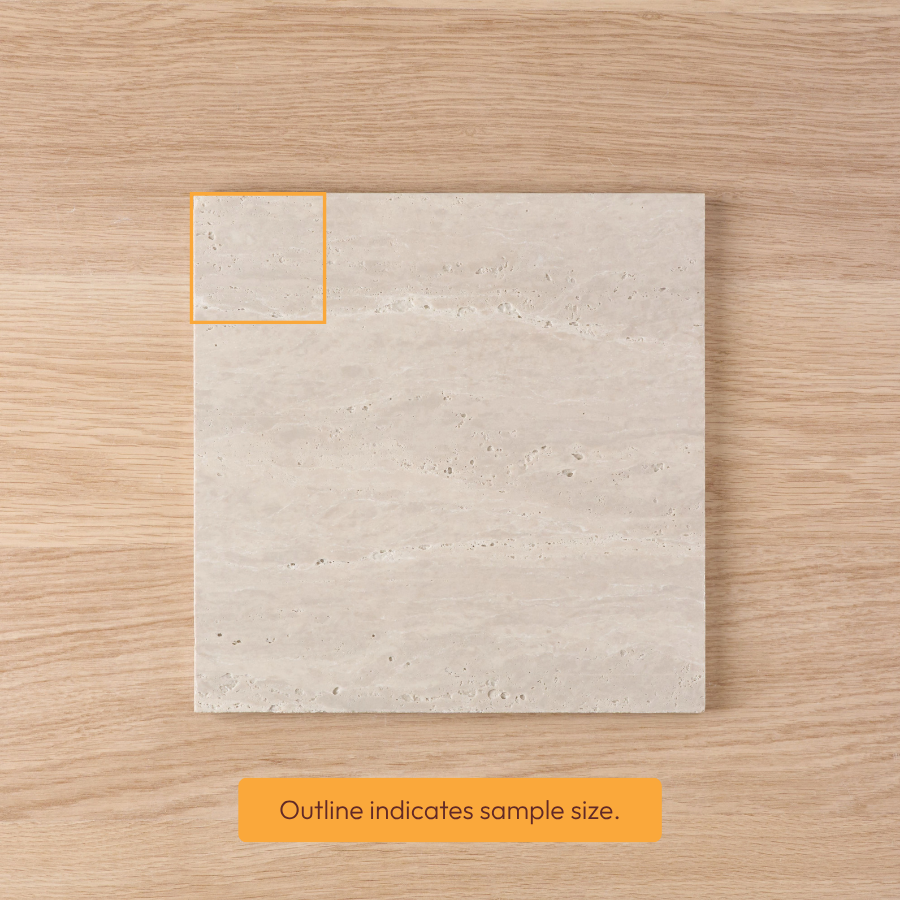 Kirribilli beige travertine-look tile sample with a subtle, porous surface pattern