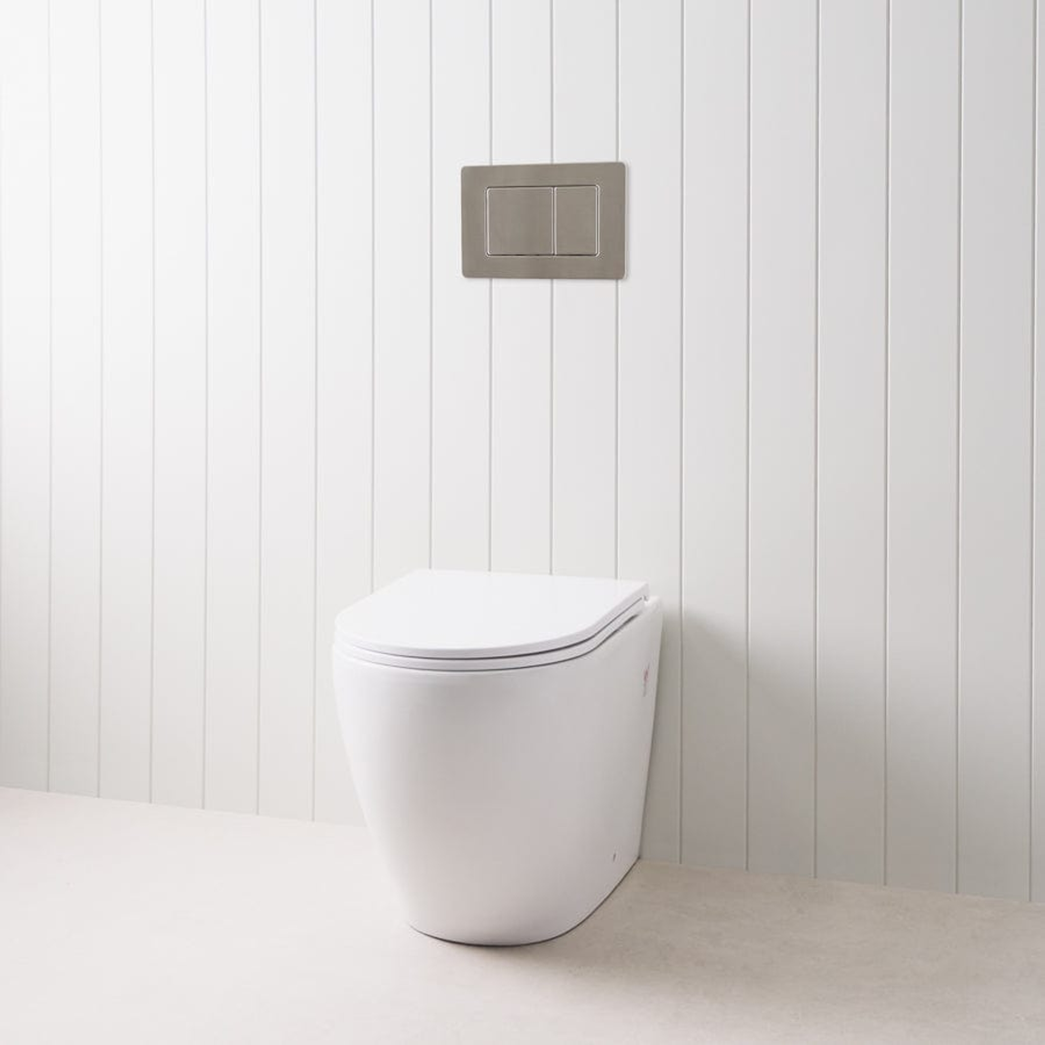 Curved In-Wall Toilet With Rectangle Gunmetal Buttons | TileCloud