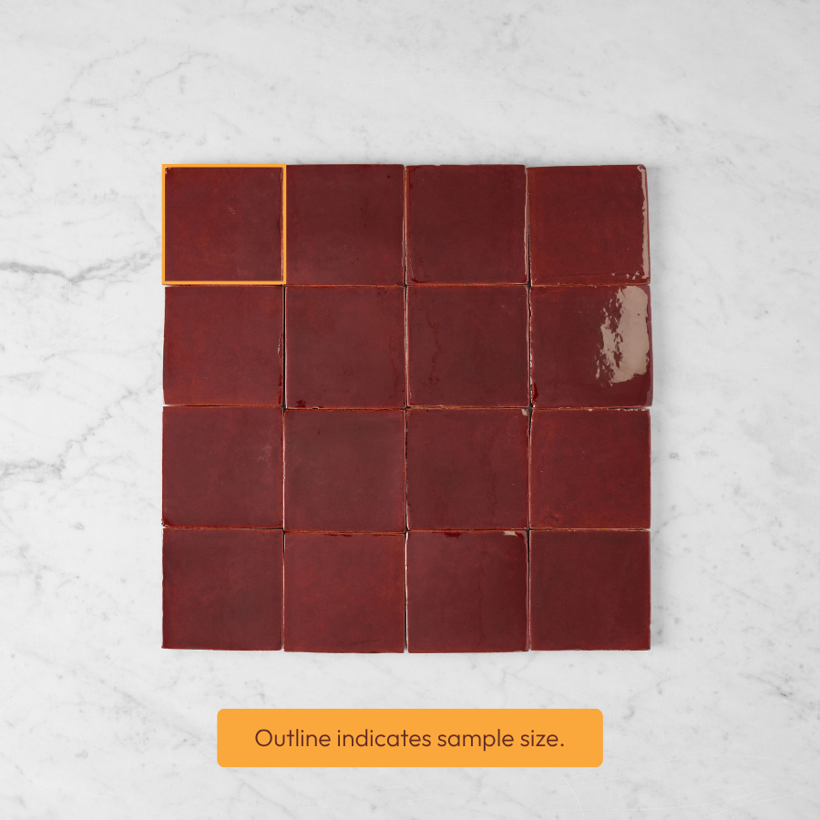 Noosa Gloss Zellige Burgundy Square Tiles arranged in a grid, with one sample outlined
