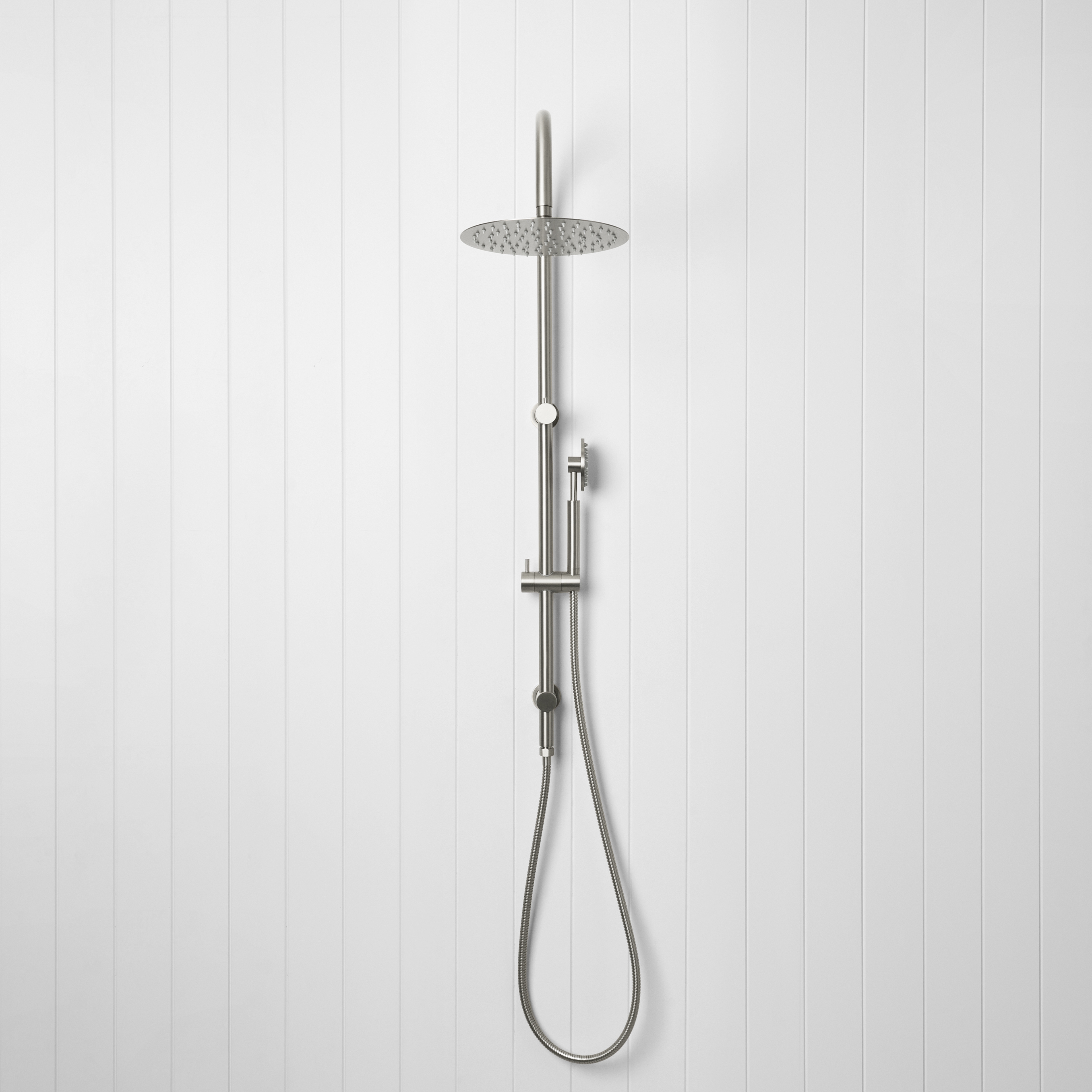 Gooseneck combination shower in stainless steel, with a round overhead shower and handheld sprayer