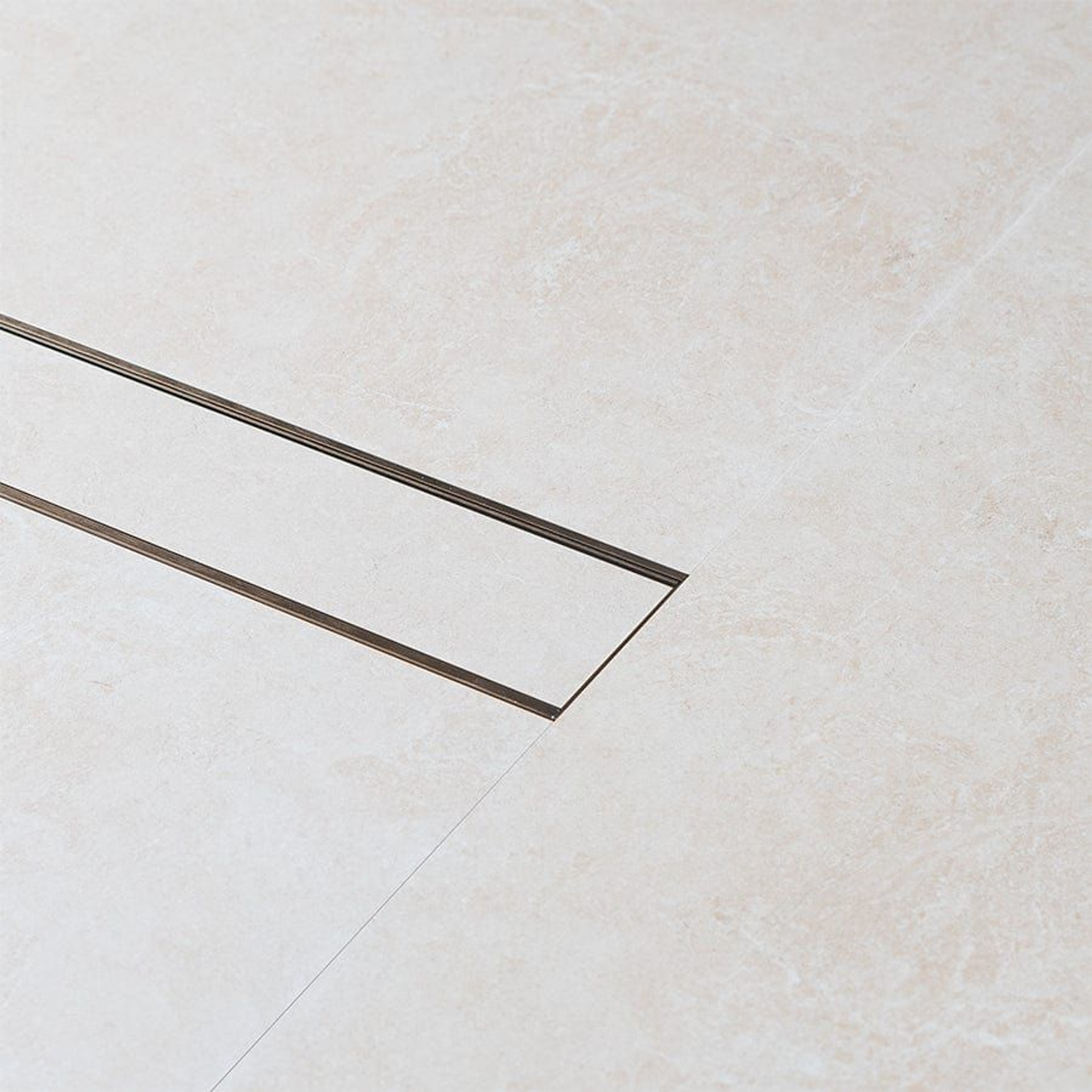 Aluminium Tile Insert Strip Drain - Cut to size - 2M Antique Brass | Yabby