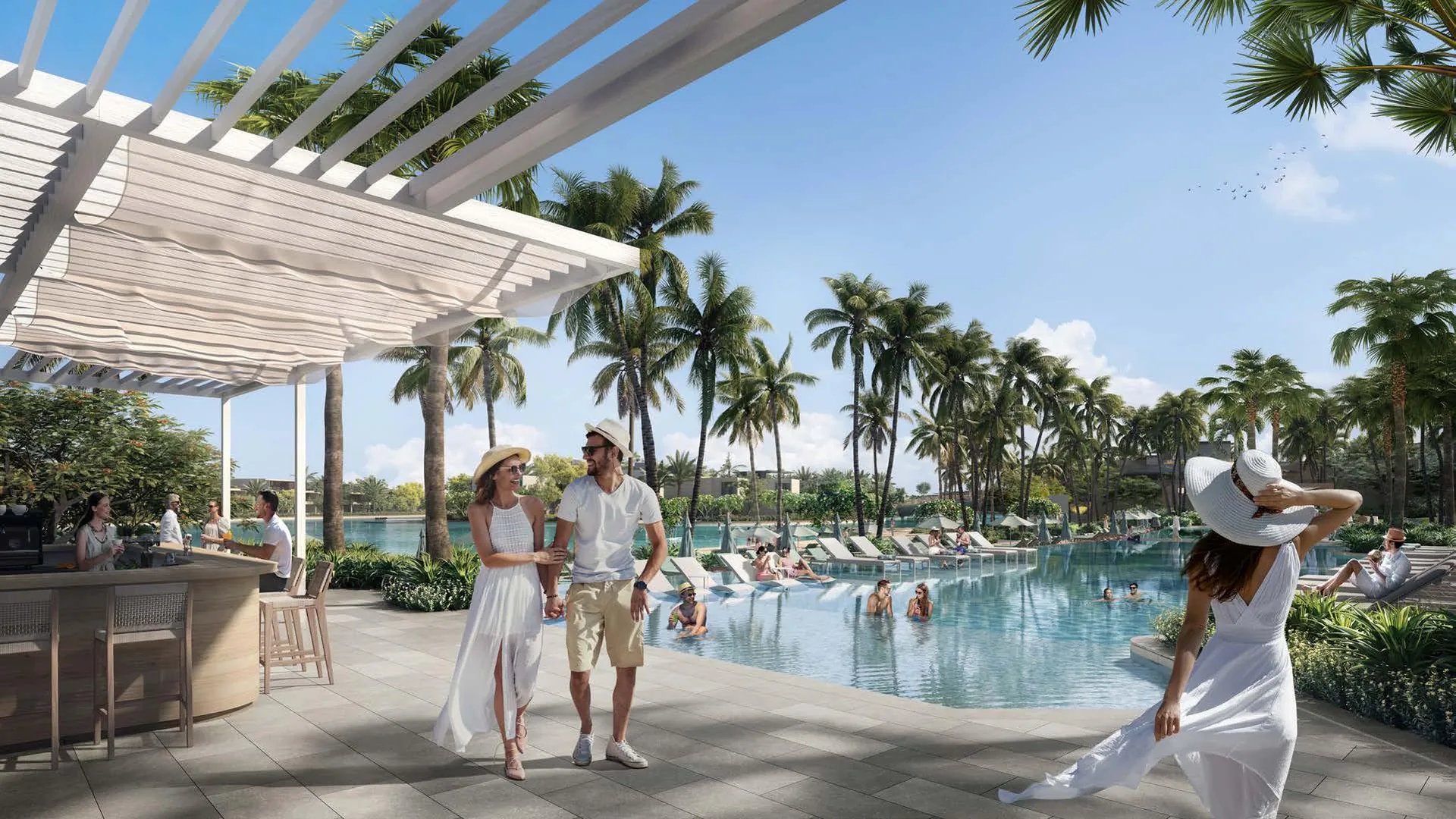 Guests beside the pool and pool bar at Plagette 32 Beach Club