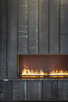 T 12 Schjødt -peis med gjenbrukskobber