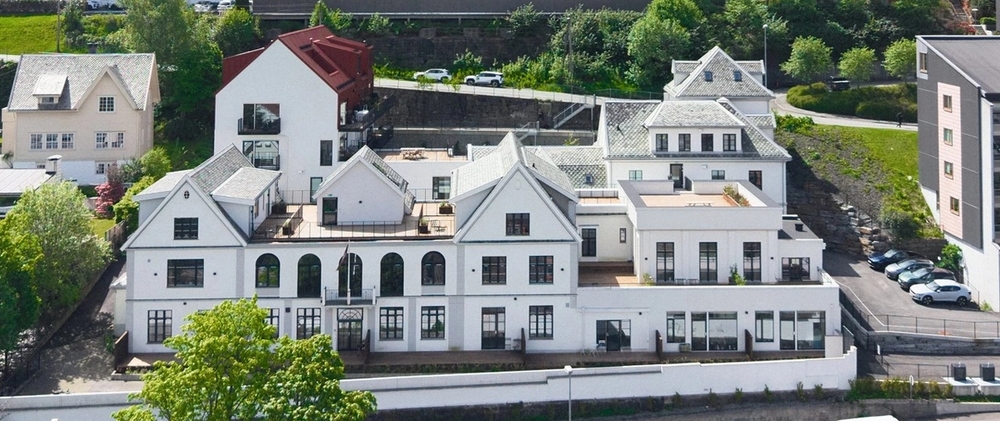 Høyegården på Gyldenpris er et transformasjonsprosjekt der en tidligere vinfabrikk fra rundt 1914 har fått nytt liv som boligområde. Arkitekt: Ole Landmark/ rehab. av En til En Arkitekter. Foto: Øystein Haara
