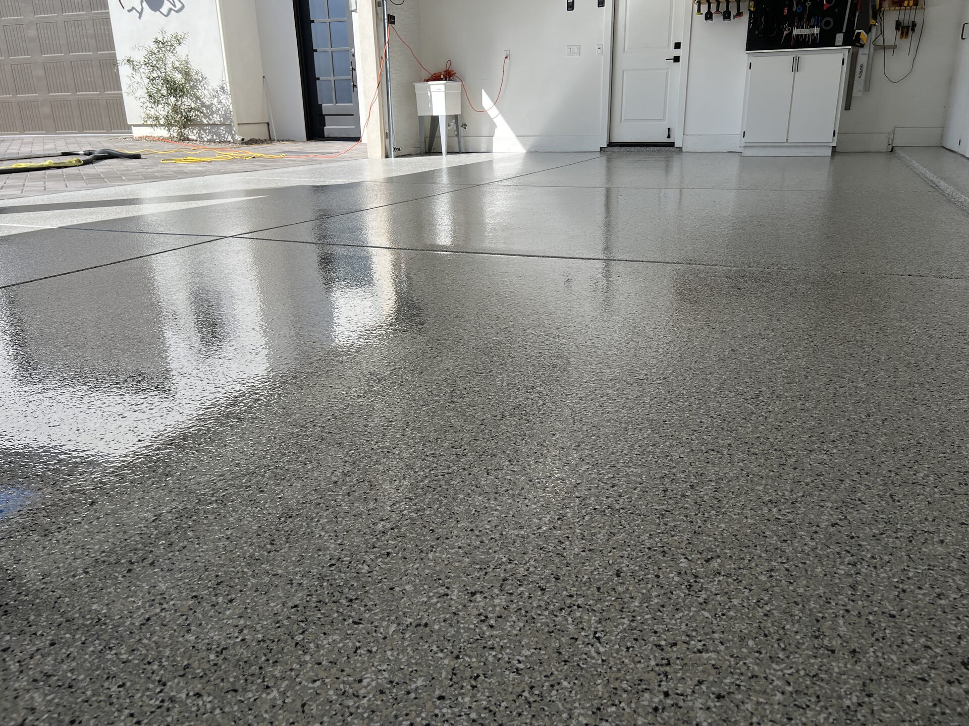 Four Corners polyaspartic flake garage floor coating