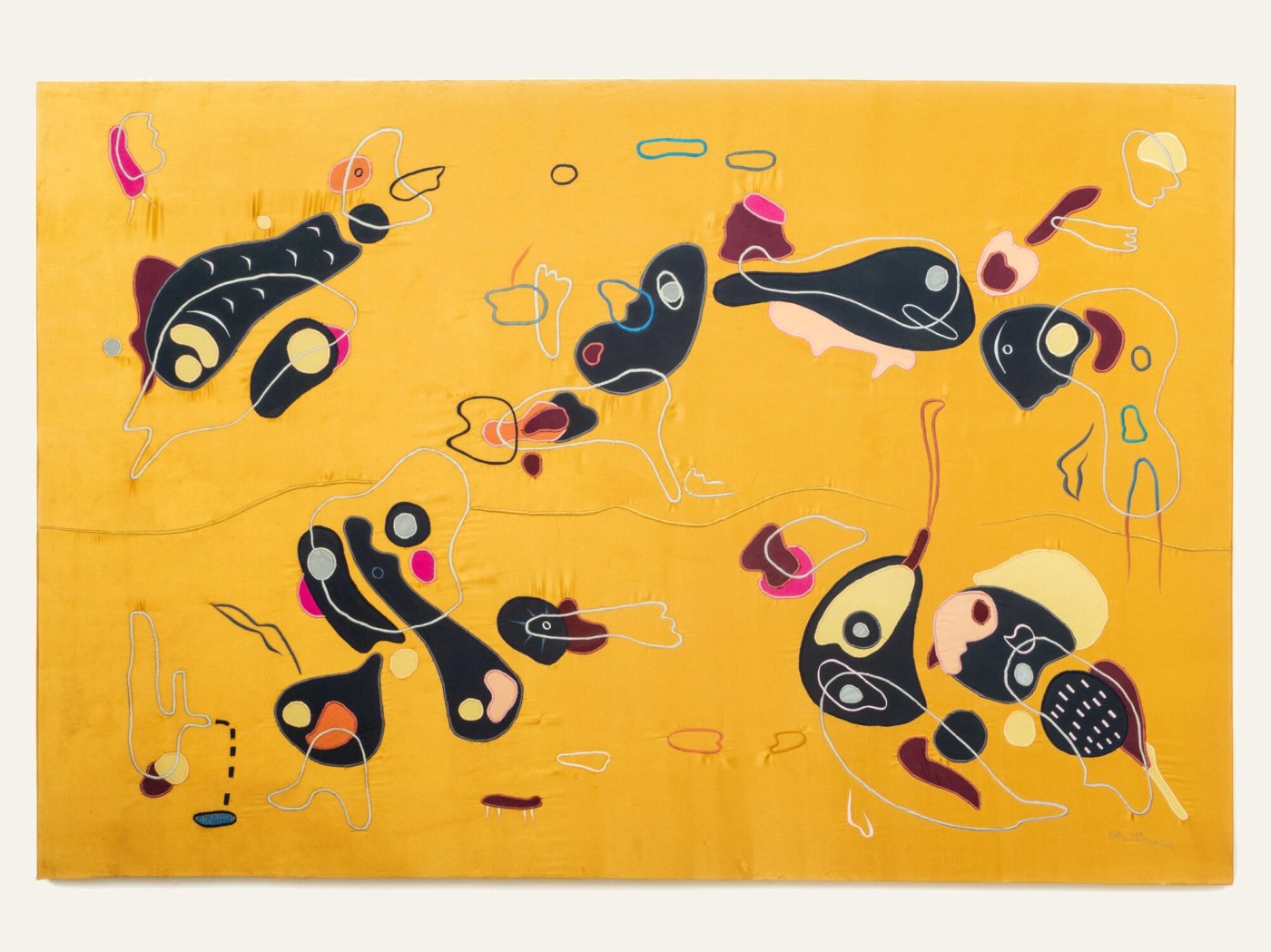 Goldfish Guerilla Pancake, shown to scale on a gallery wall