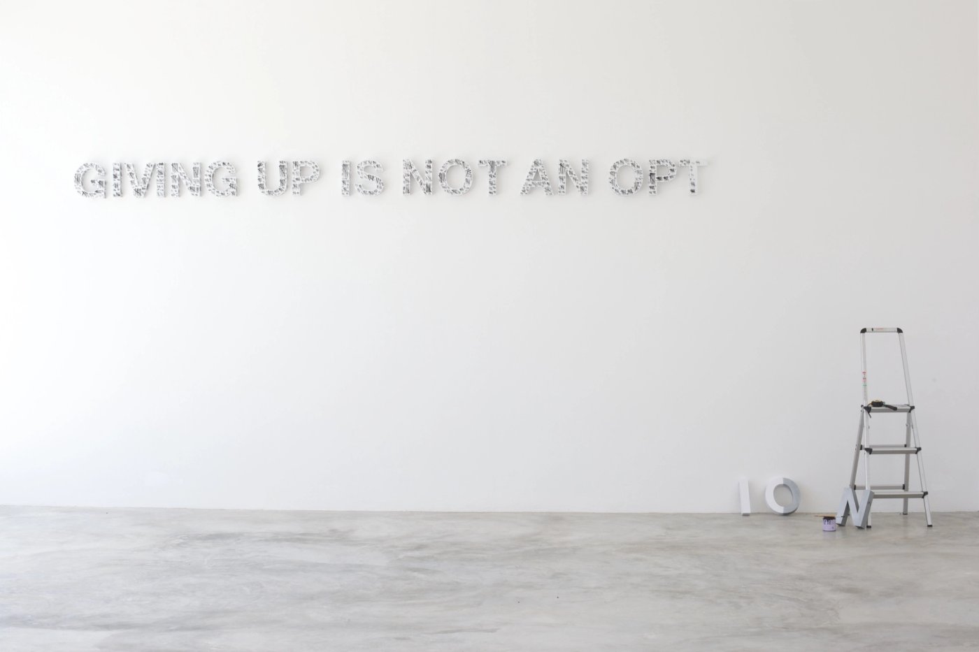 Giving Up Is Not an Option, shown to scale on a gallery wall