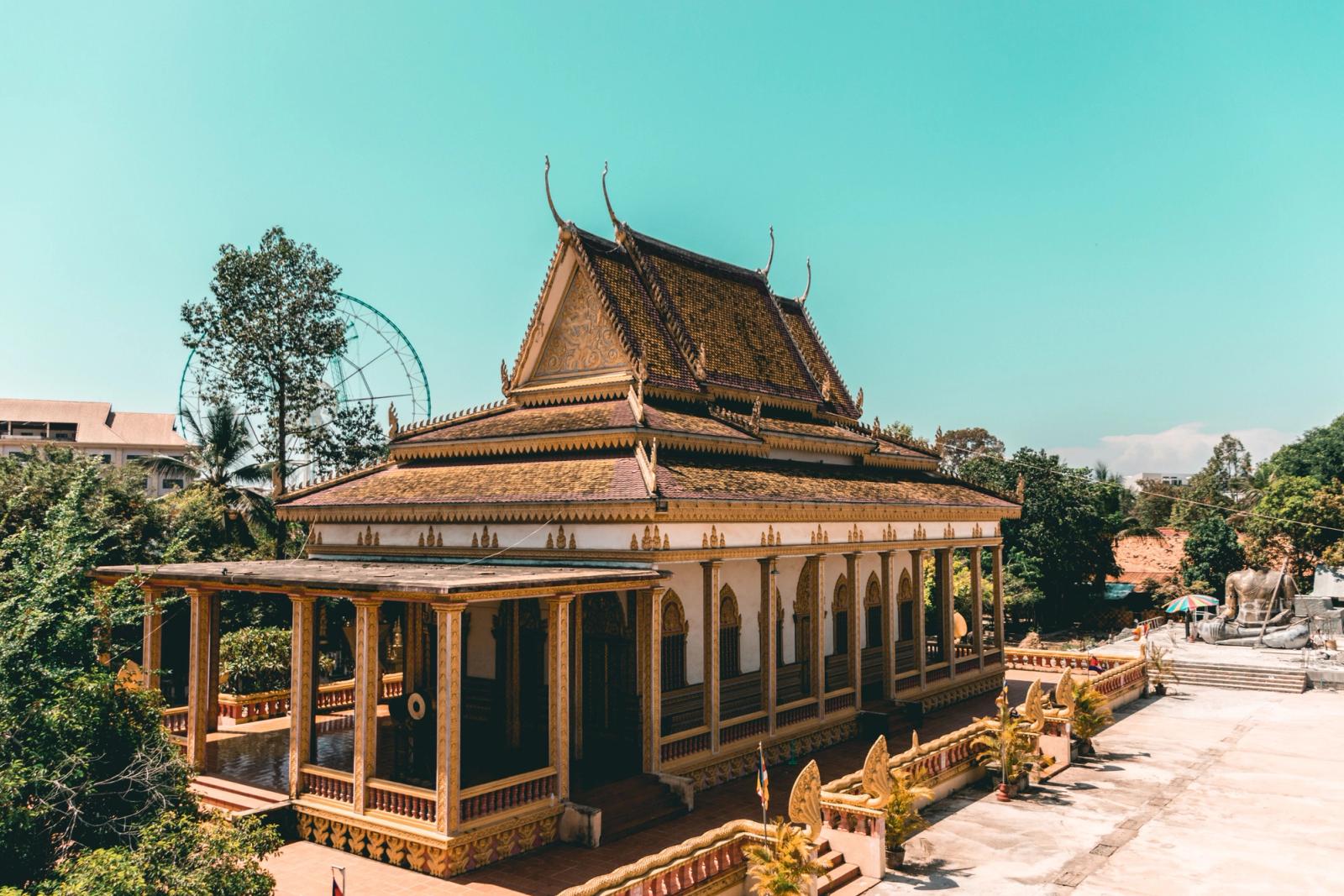 A stunning traditional Cambodian temple under a bright sky in Siem Reap, Cambodia