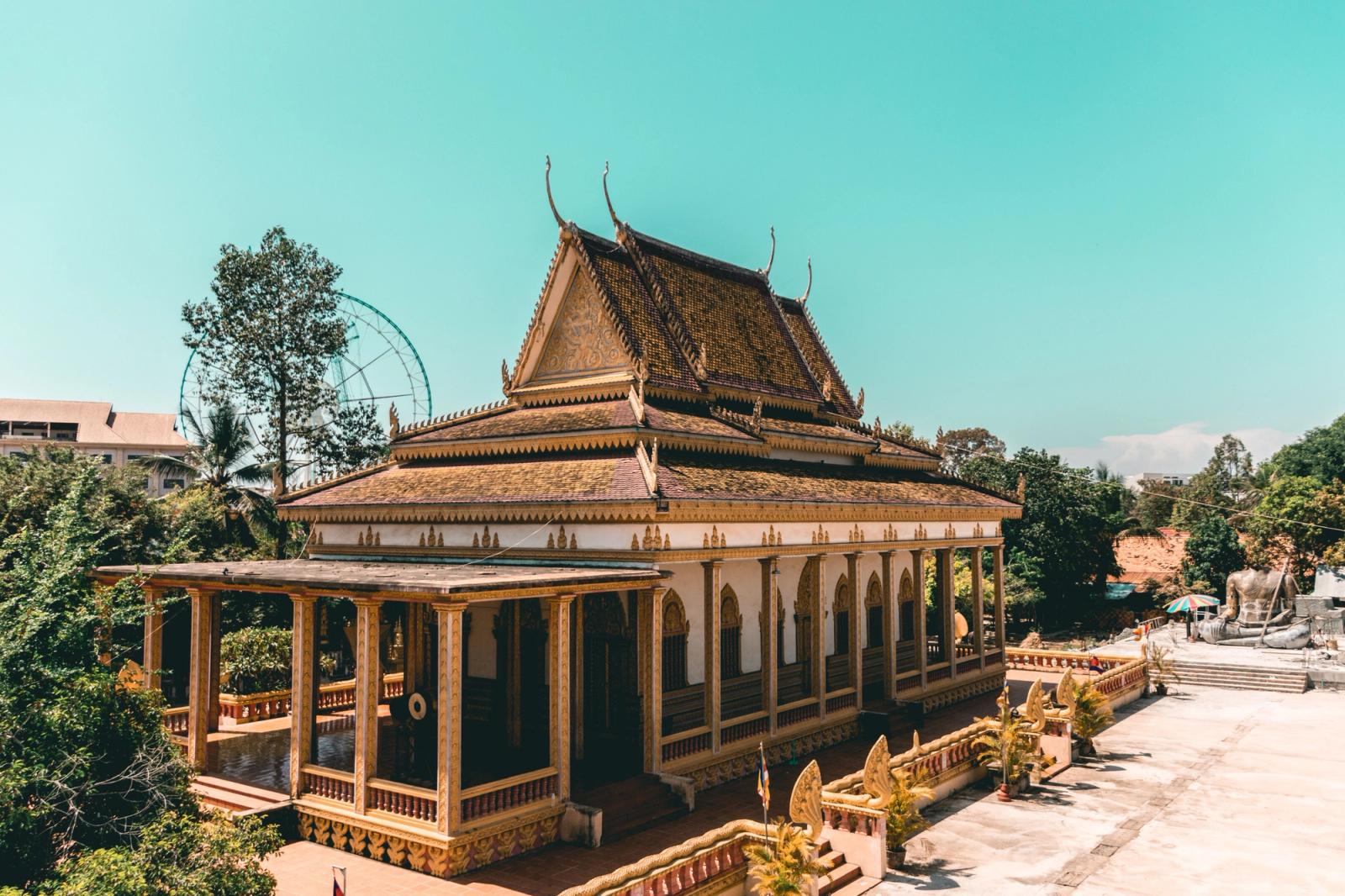 A stunning traditional Cambodian temple under a bright sky in Siem Reap, Cambodia