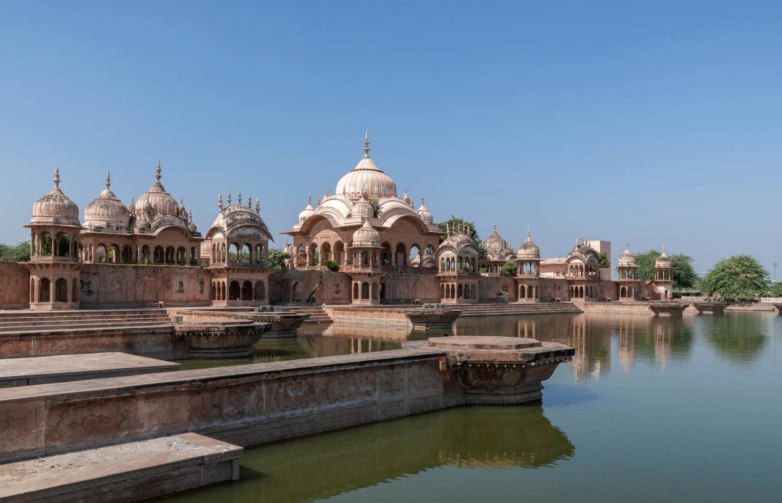 Scenic view of beautiful temples reflecting in water at Govardhan, Uttar Pradesh, India