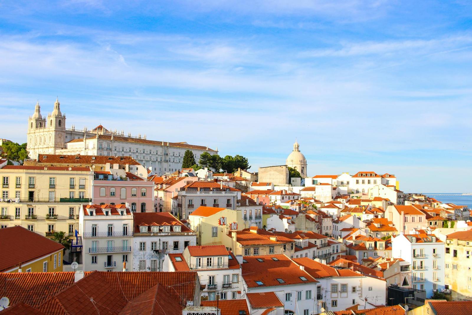 Hillside old town with terracotta rooftops overlooking the sea
