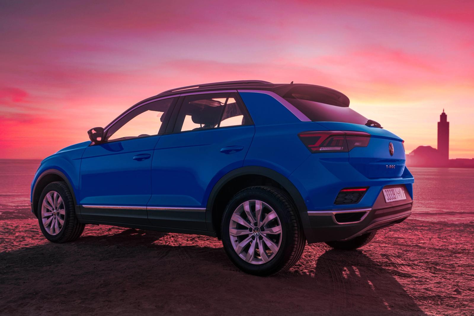 Blue SUV parked by the ocean at sunset in Casablanca, Morocco