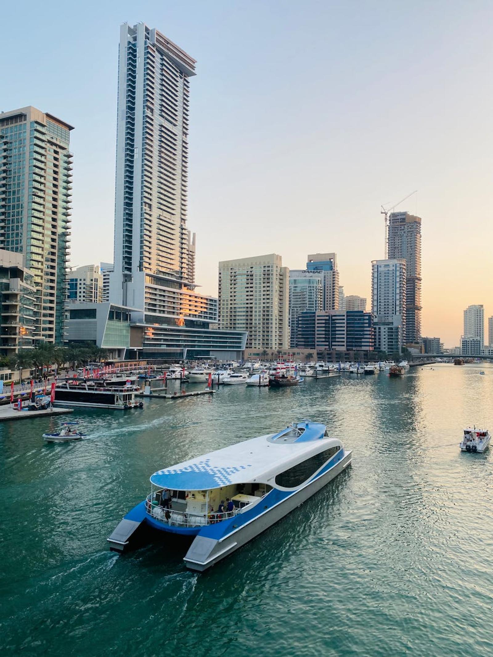 Evening on Dubai Marina, city lights reflected on the water