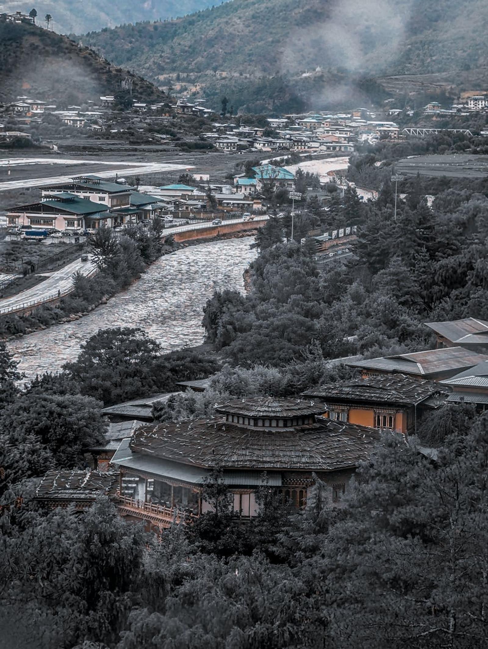 Stunning aerial shot of Paro Valley, Bhutan showcasing traditional architecture and lush landscape