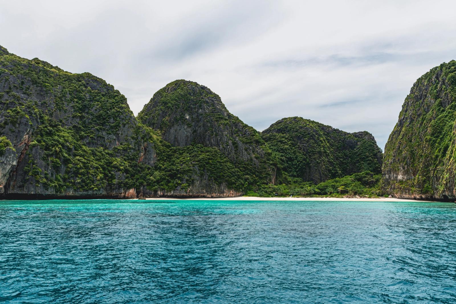 Beautiful turquoise waters and limestone cliffs in Phuket, Thailand