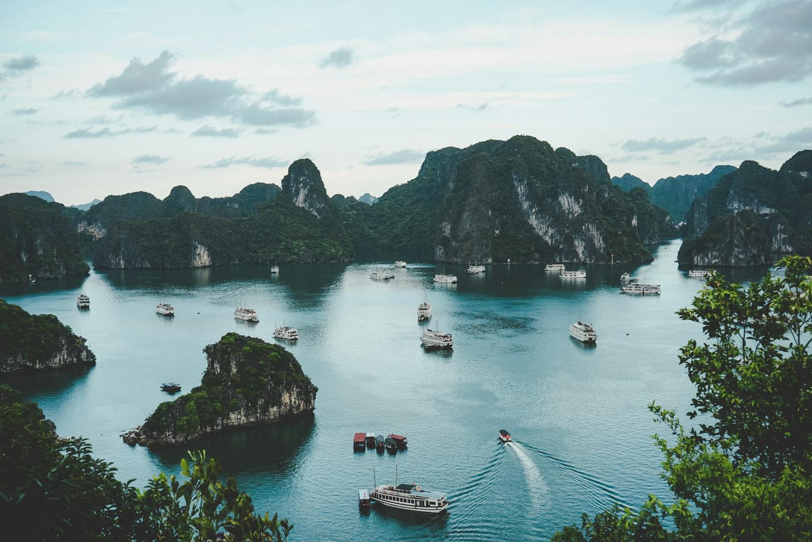 Limestone karsts rising from the emerald water of Ha Long Bay