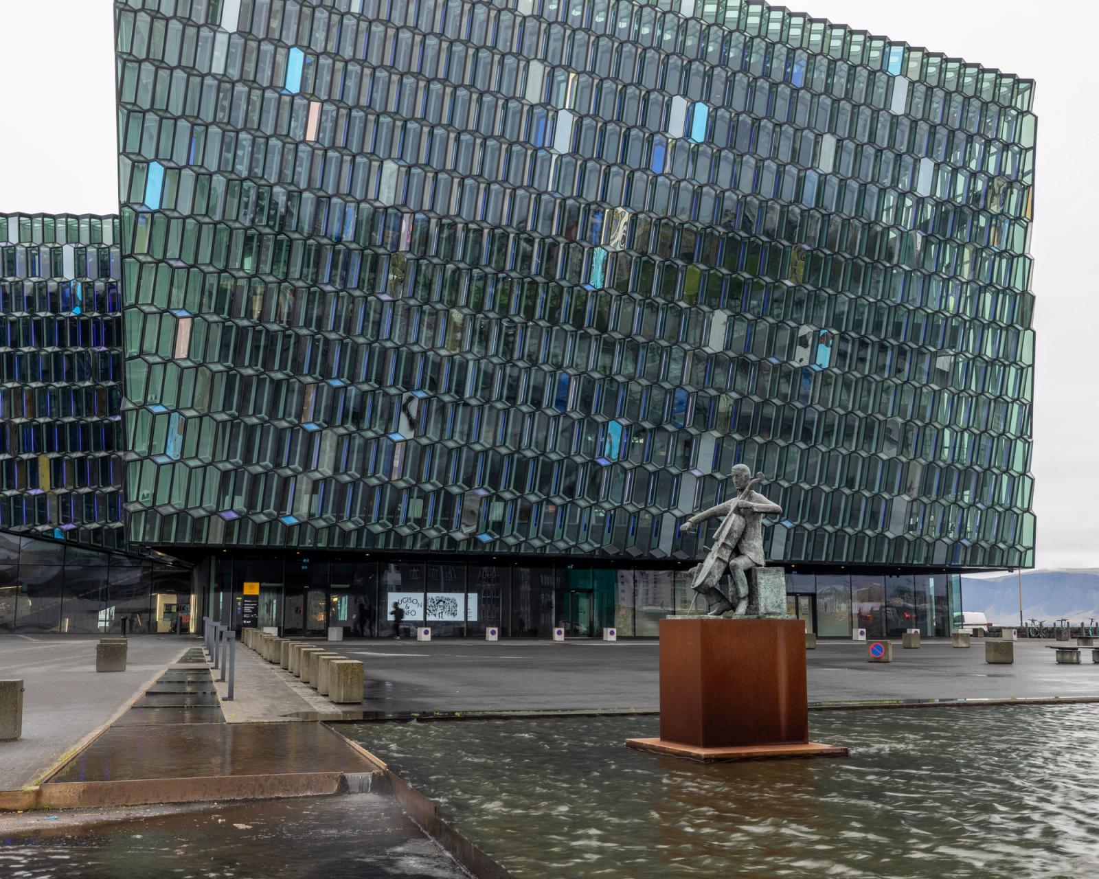 View of Harpa concert hall in Reykjavik, Iceland with unique glass facade design