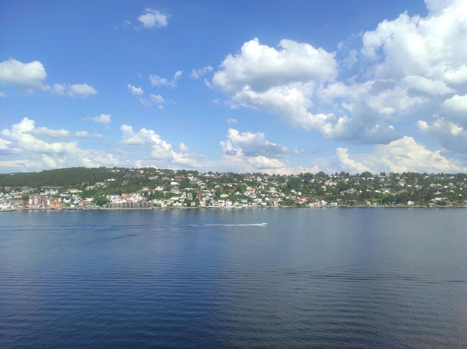 Beautiful landscape of Oslofjord with clouds and serene waters, capturing Oslo's scenic beauty