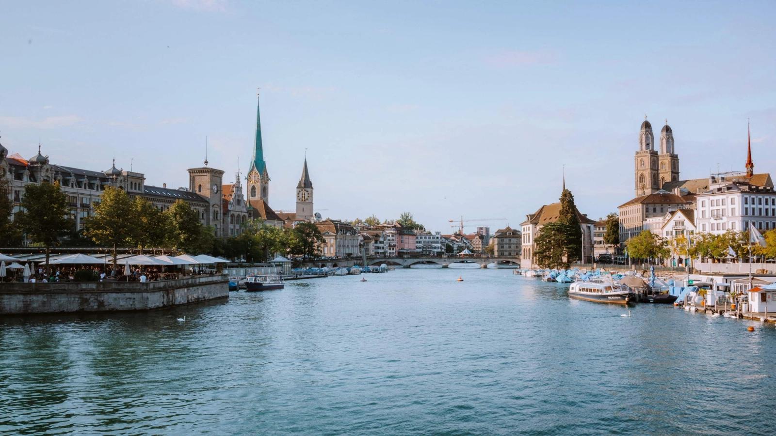 Explore the picturesque waterfront of Zürich with historical landmarks and serene waterways