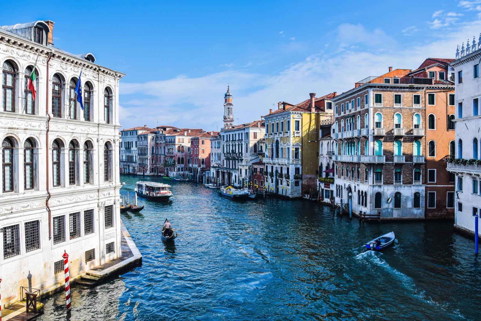 Beautiful view of the Grand Canal with gondolas and historic buildings in Venice, Italy