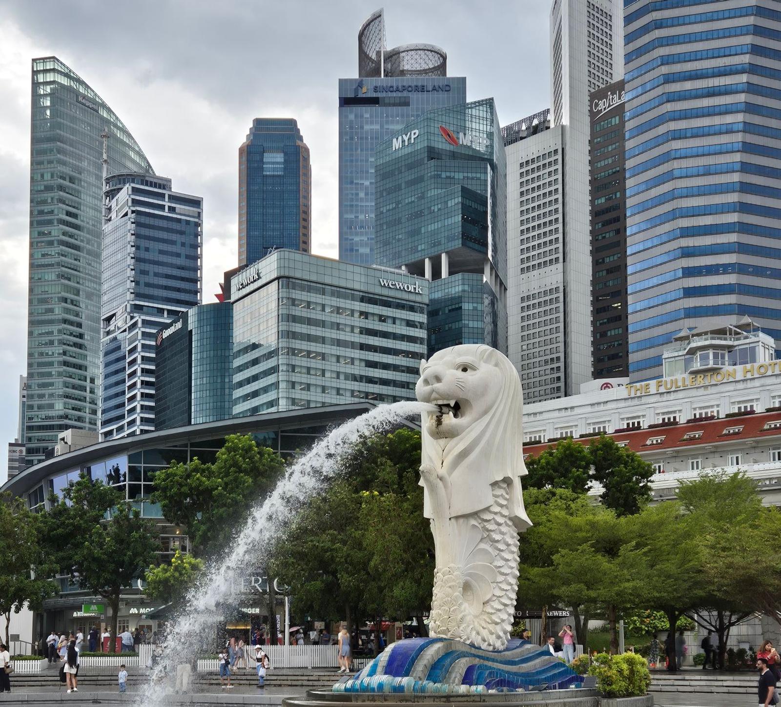 The Merlion fountain with Singapore's modern skyline in the background