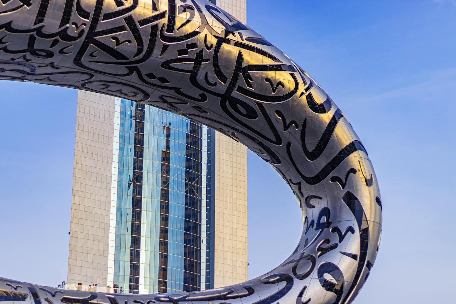 Stunning view of Dubai's iconic Museum of the Future against a blue sky