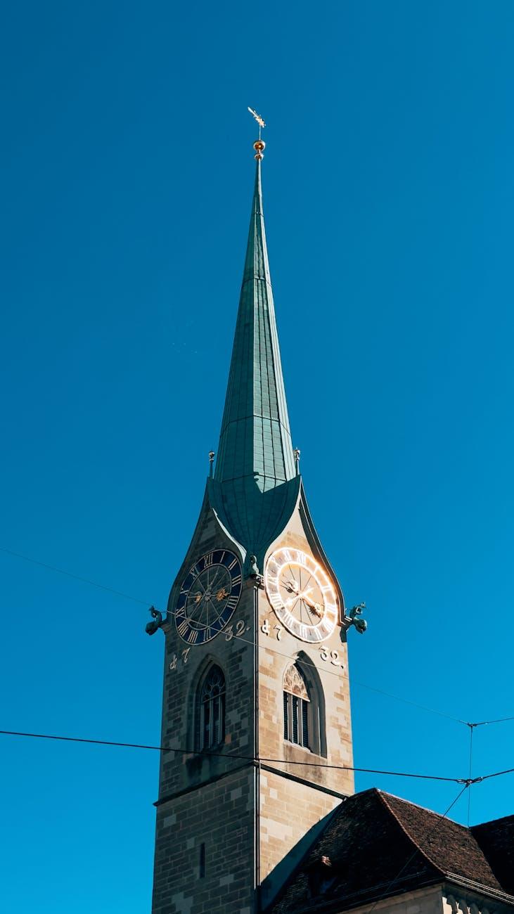 High-angle view of Fraumünster Church tower against clear blue sky in Zurich, Switzerland
