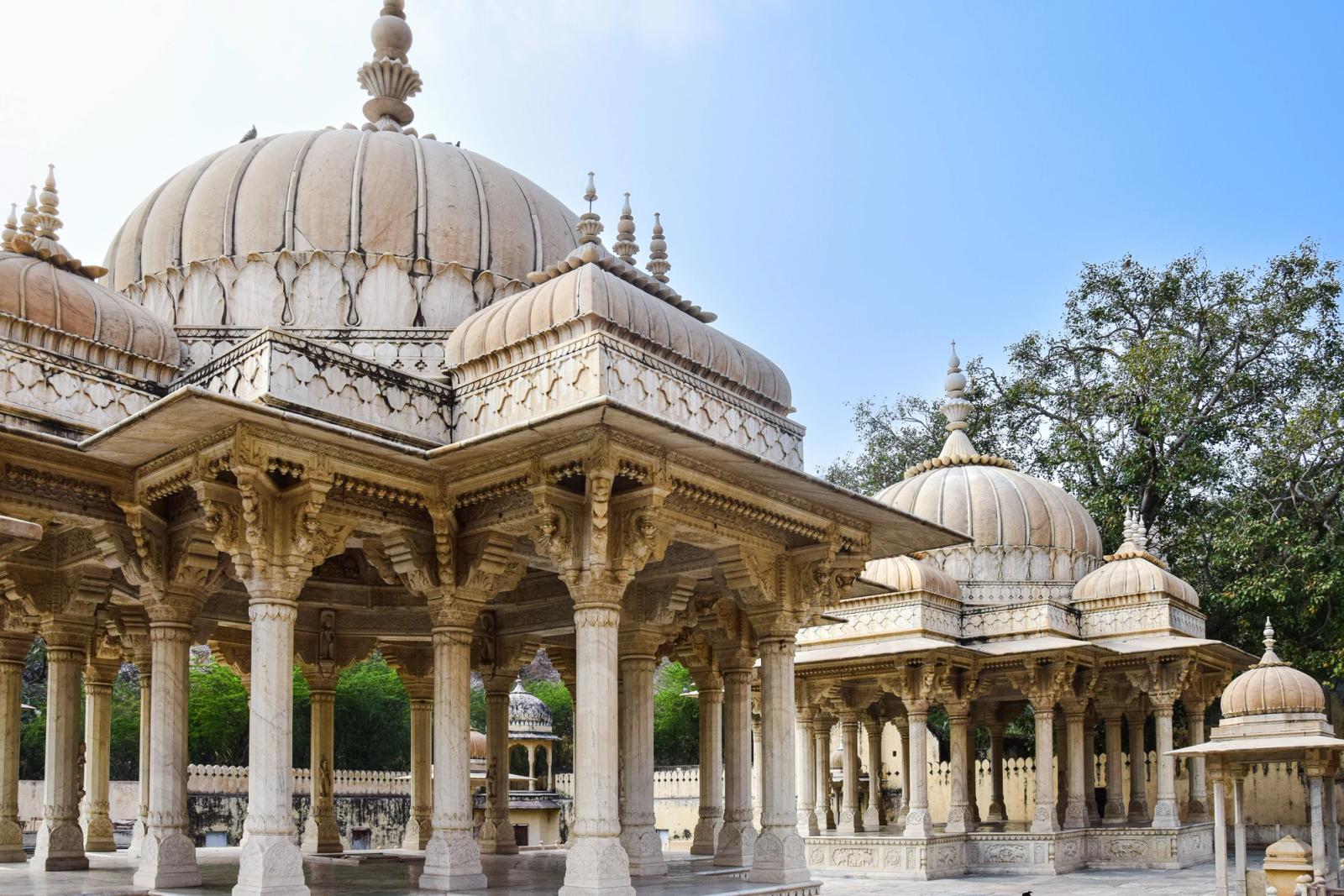 Majestic domed cenotaphs at Gaitor Ki Chhatriyan in Jaipur, India, showcasing intricate architecture