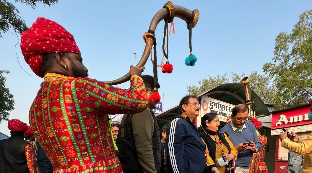 A men plaing indian instrument