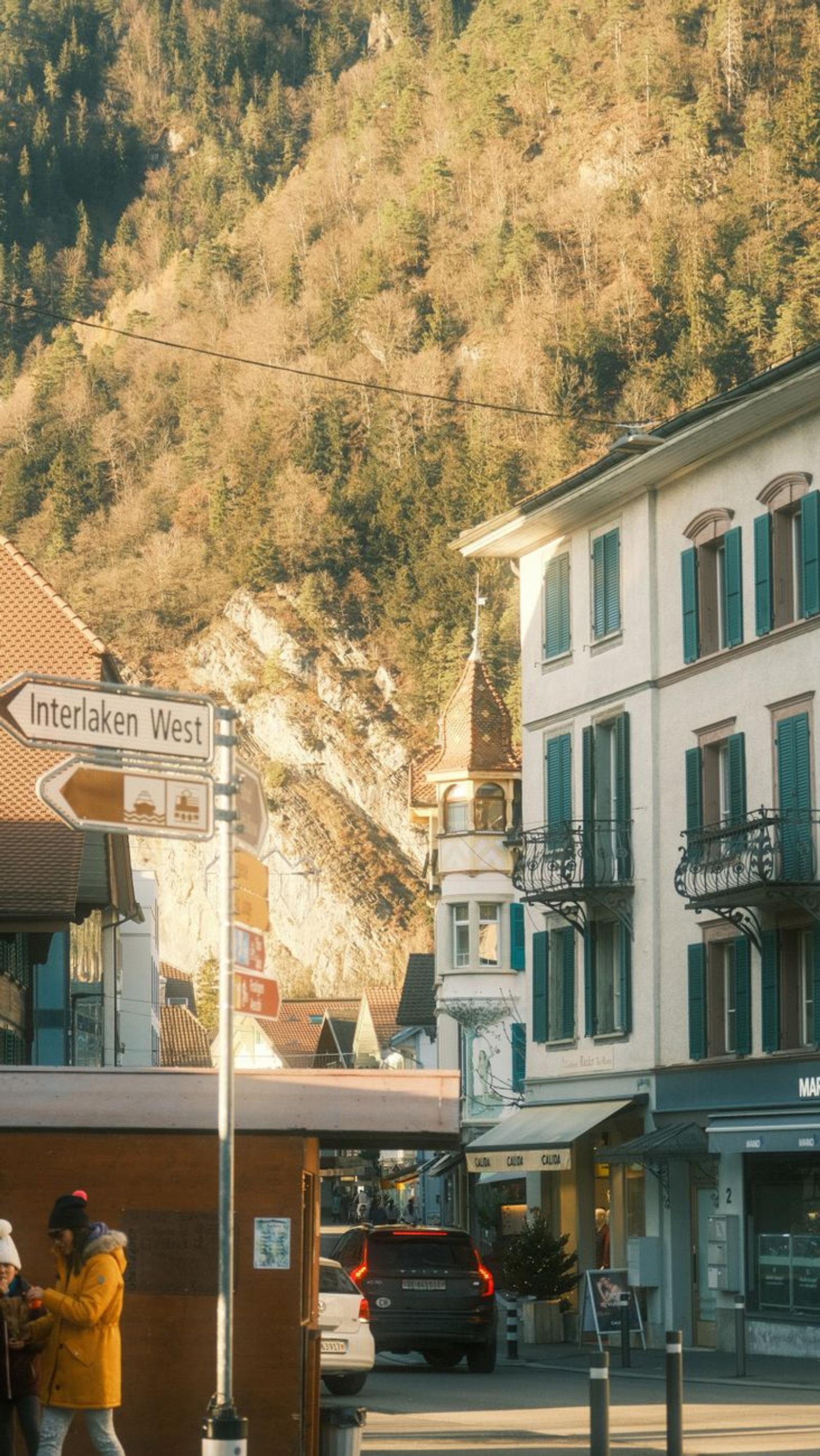 Charming street scene in Interlaken West with mountain backdrop