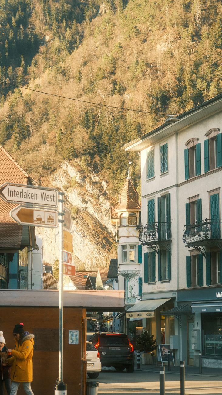 Charming street scene in Interlaken West with mountain backdrop