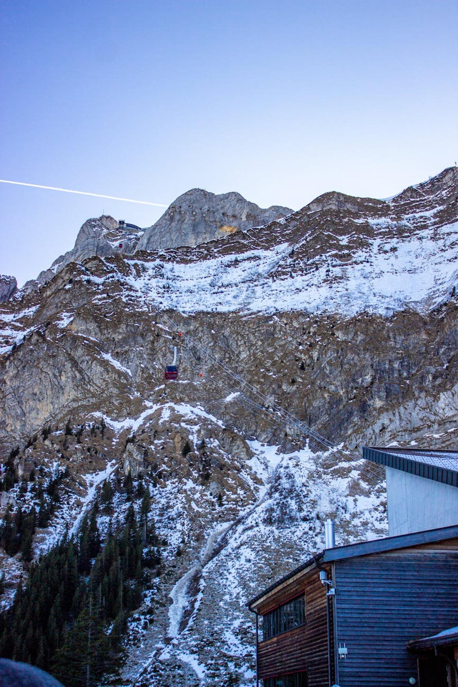 Stunning winter landscape of Mount Pilatus featuring snowy peaks and cable car