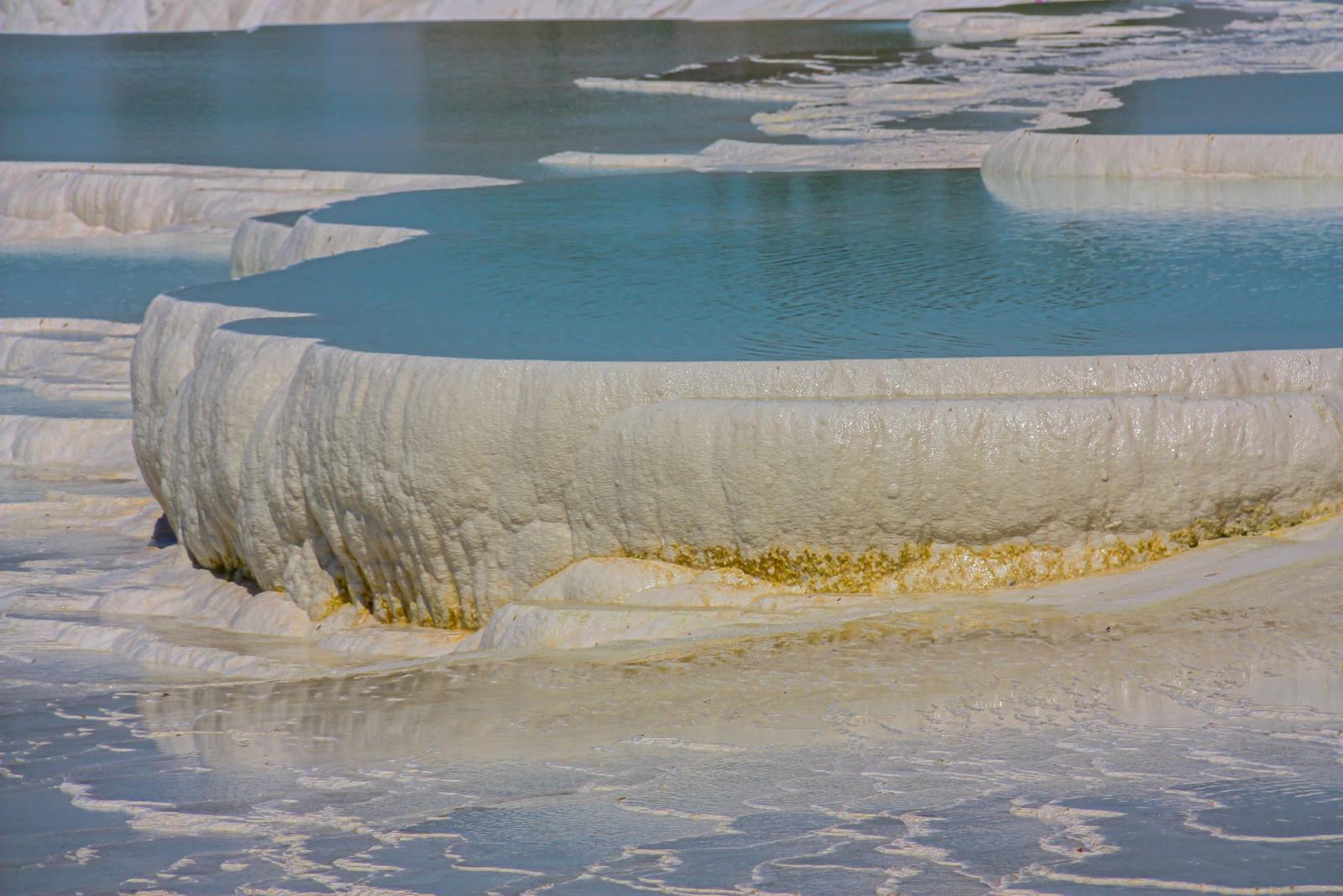 A breathtaking view of the natural terraced hot springs in Pamukkale, Turkey