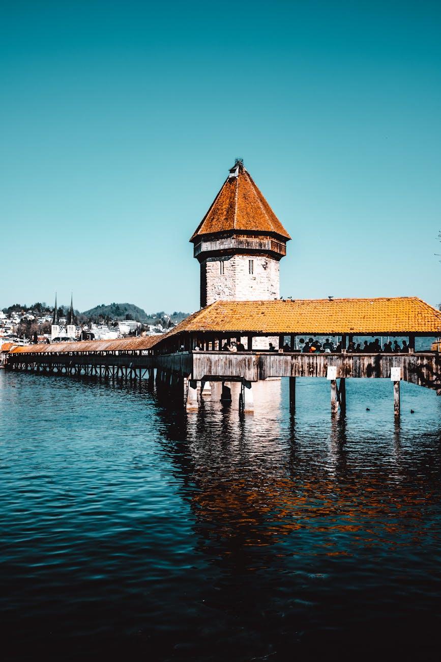 Picturesque view of Chapel Bridge over Reuss River in Lucerne, Switzerland