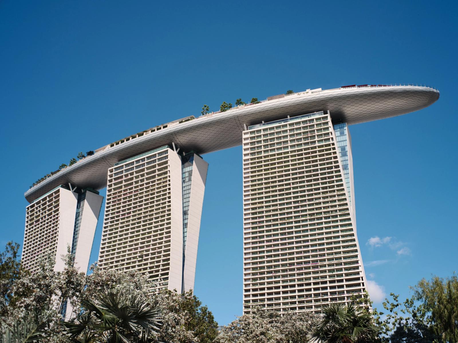 View of the famous Marina Bay Sands hotel with clear blue skies in Singapore