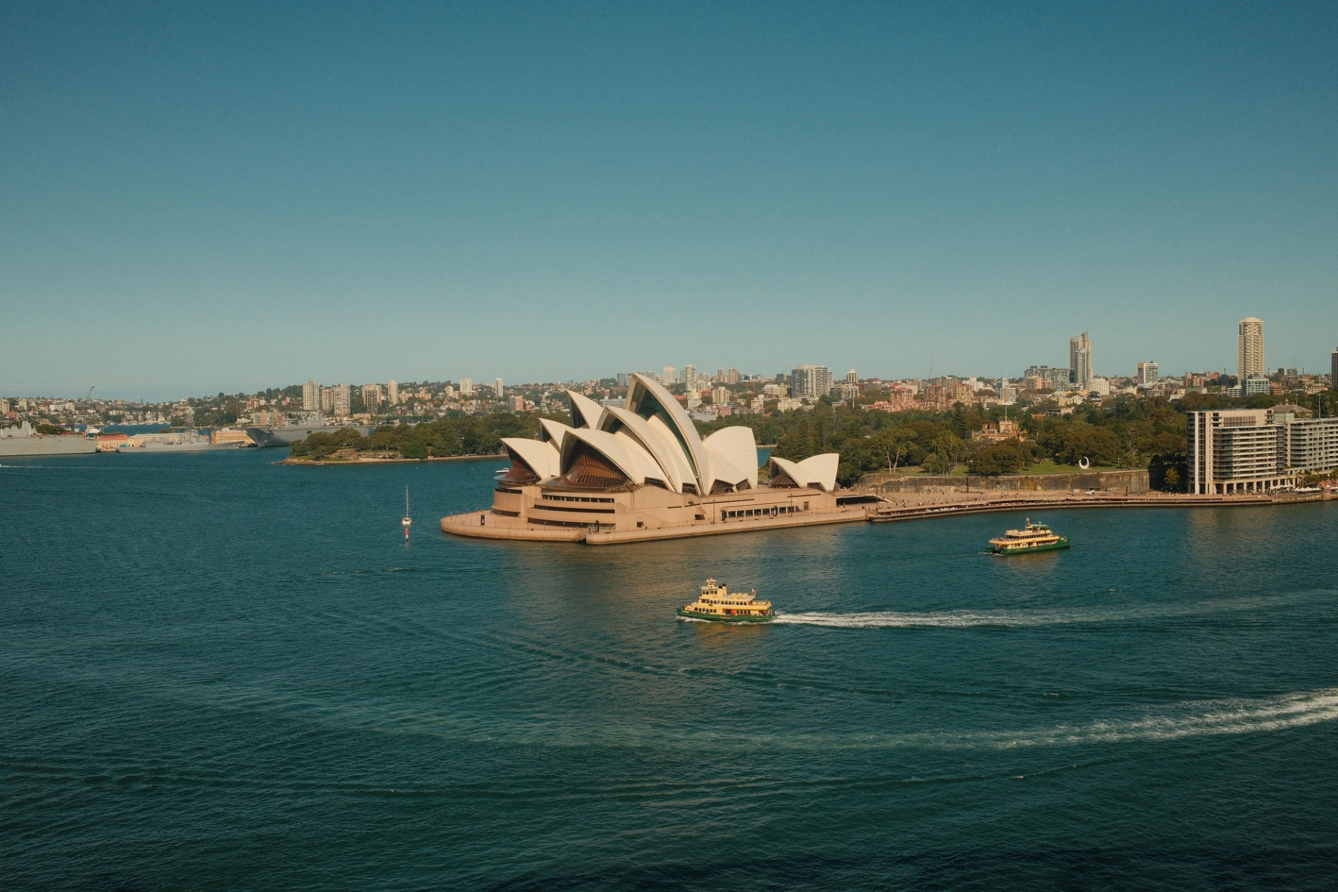 Aerial view of Sydney Opera House with ferries in Sydney Harbour, Australia