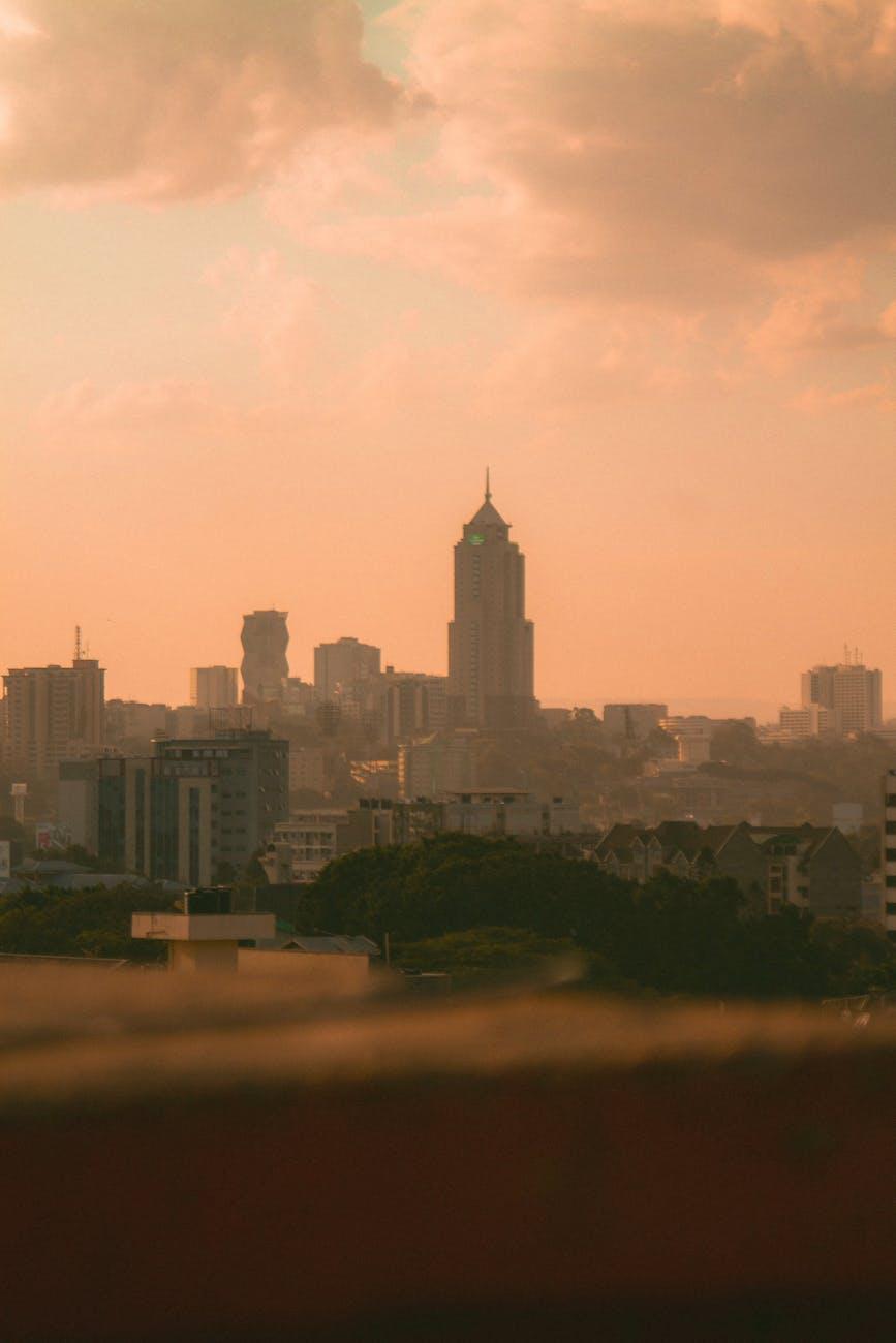 Stunning Nairobi skyline with modern skyscrapers and a dramatic sky at sunset