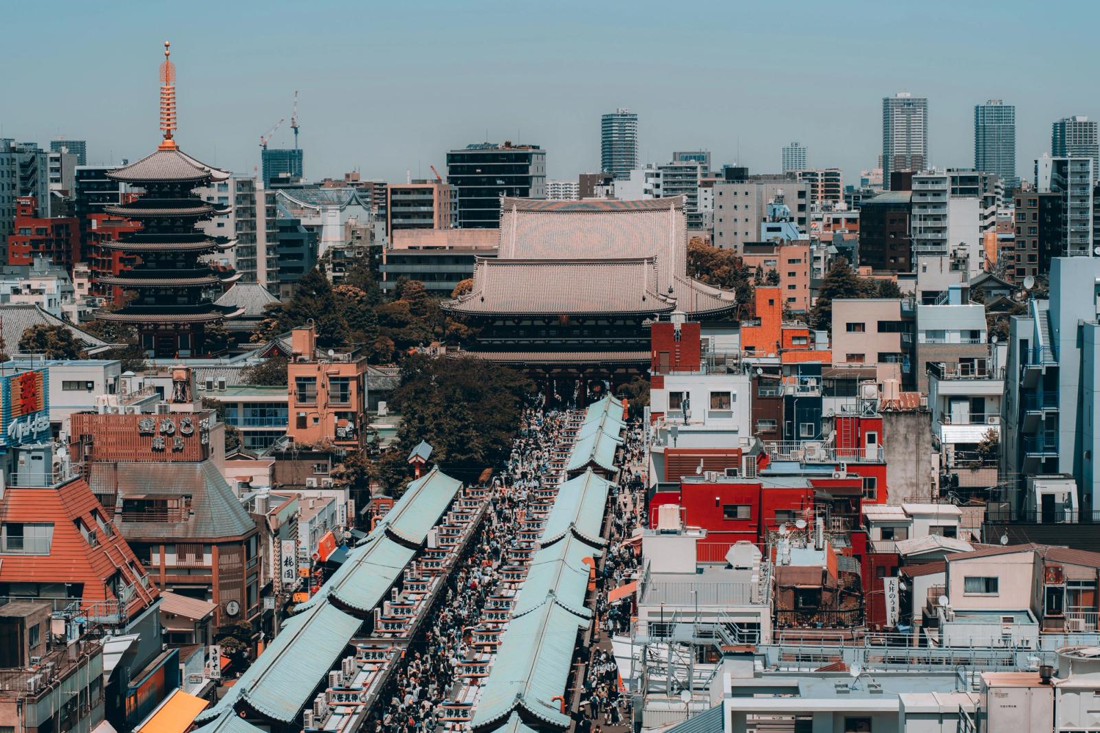 Explore the bustling Nakamise Shopping Street with iconic Asakusa temple backdrop in Tokyo, Japan
