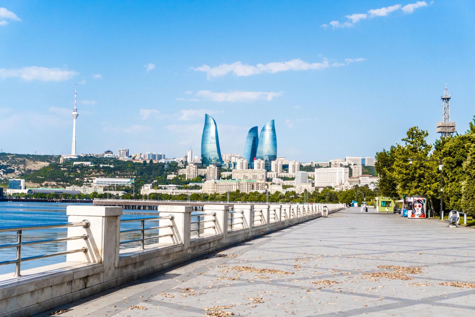 Scenic view of Baku's skyline with Flame Towers and promenade