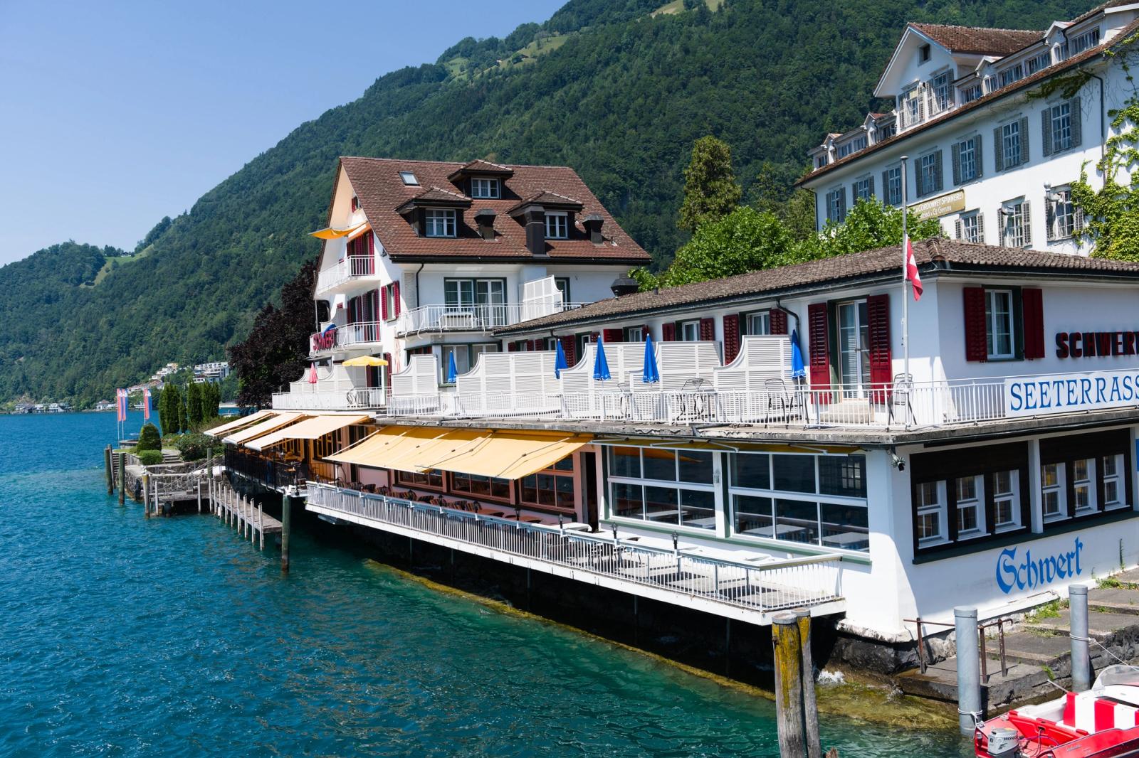 Charming lakeside buildings with vibrant colors along Lake Lucerne in Switzerland