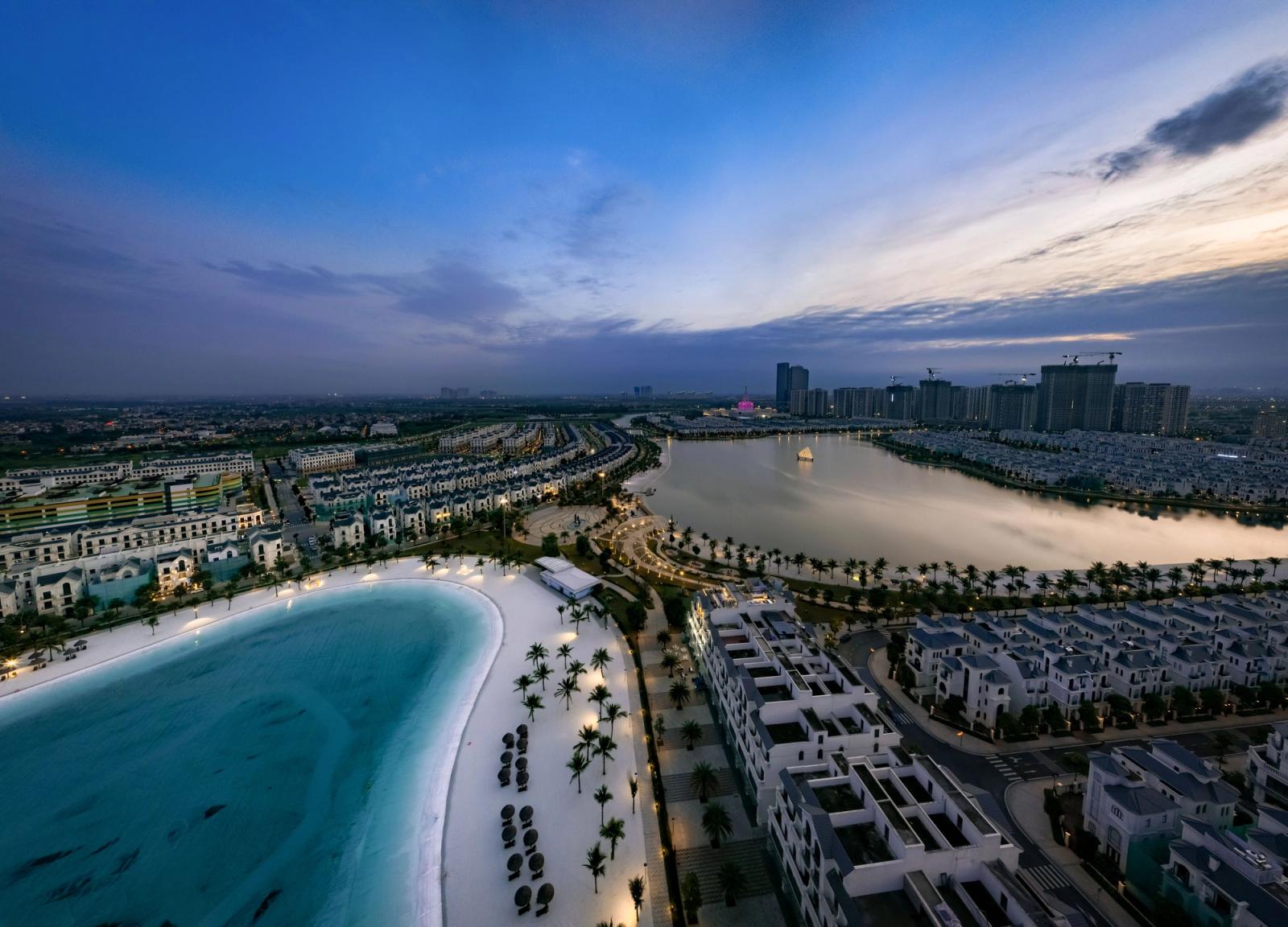 Stunning aerial view of Vinhomes and Ocean Park in Hanoi, Vietnam at dusk, showcasing urban beauty