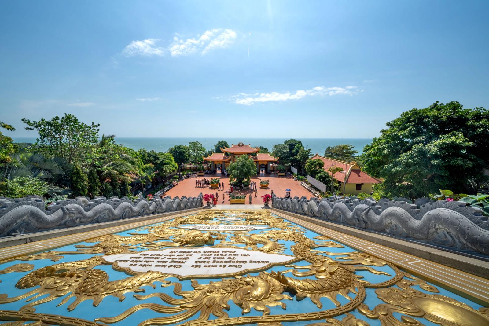 A panoramic view of Ho Quoc Pagoda in Phu Quoc, Vietnam, overlooking the ocean on a sunny day