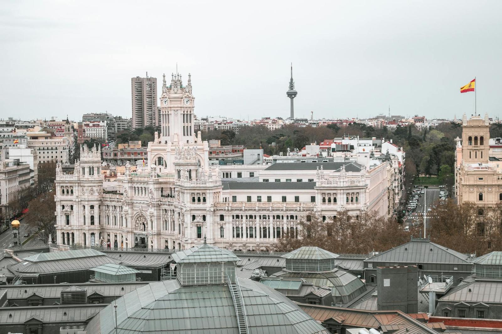 Captivating aerial view of the iconic Palacio de Cibeles and Madrid cityscape, Spain
