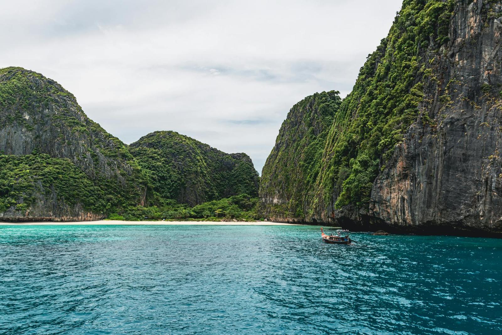 Beautiful coastal view of limestone cliffs and turquoise waters in Phuket, Thailand