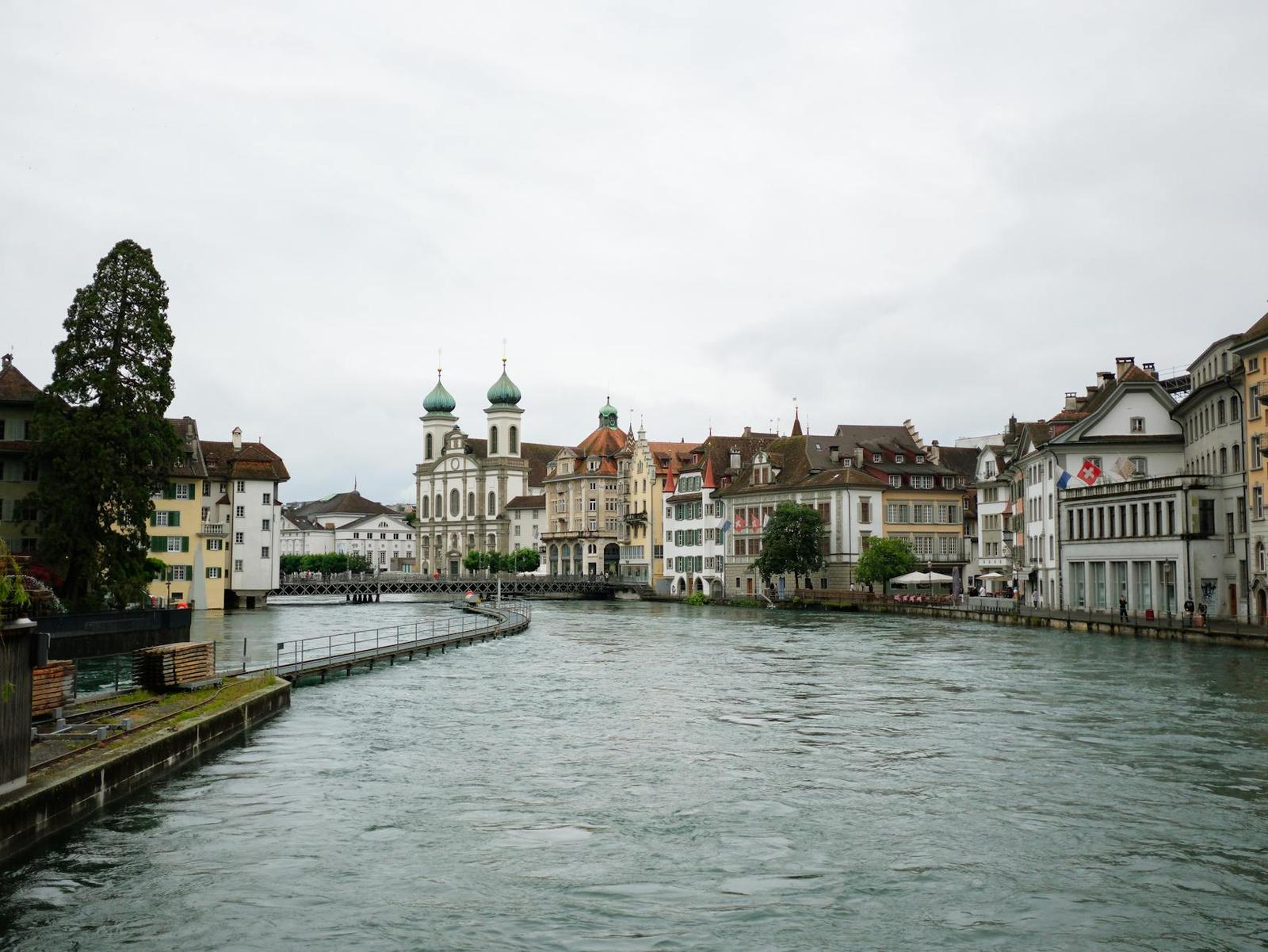 Scenic view of Luzern cityscape featuring historic architecture along the Reuss River